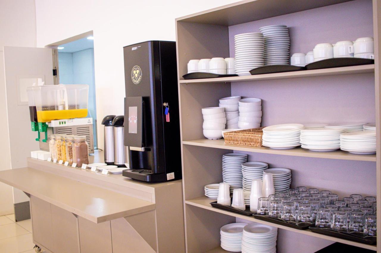 Hotel H2 Congonhas Congonhas  Luaran gambar A typical self-service station