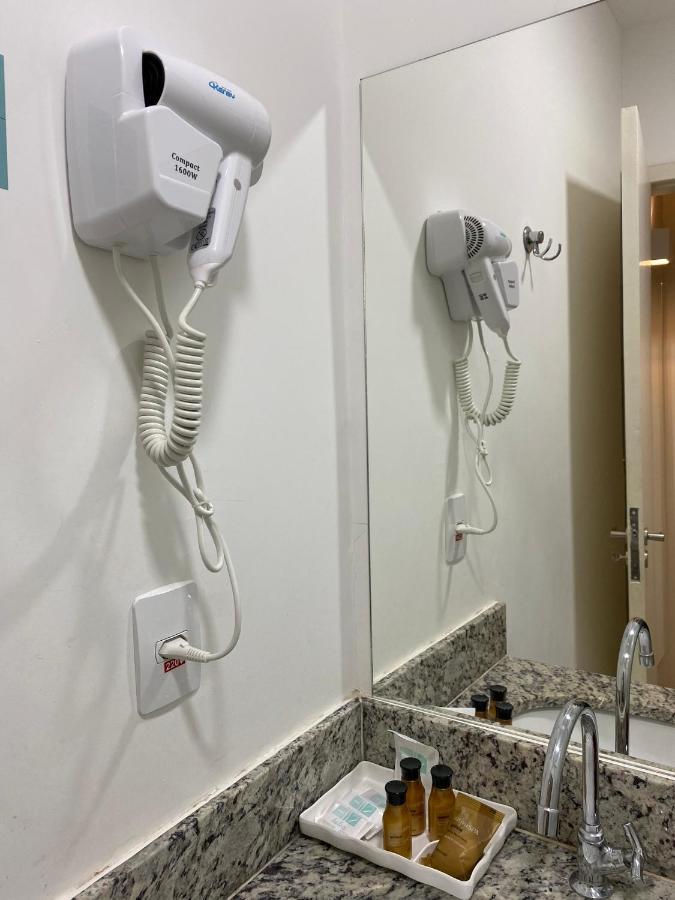 Hotel H2 Congonhas Congonhas  Luaran gambar A hair dryer in a hotel room